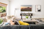 Wall TV with cable and streaming capabilities
